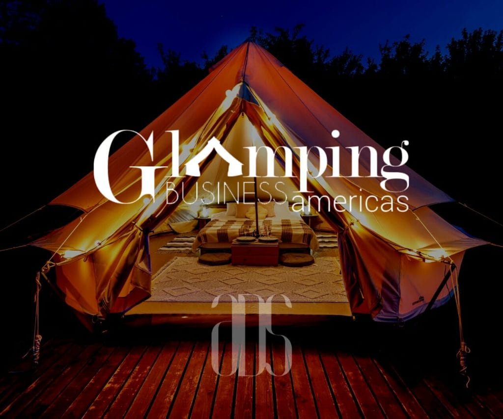 Glamping Americas Magazine logo on a photo of a glamping tent