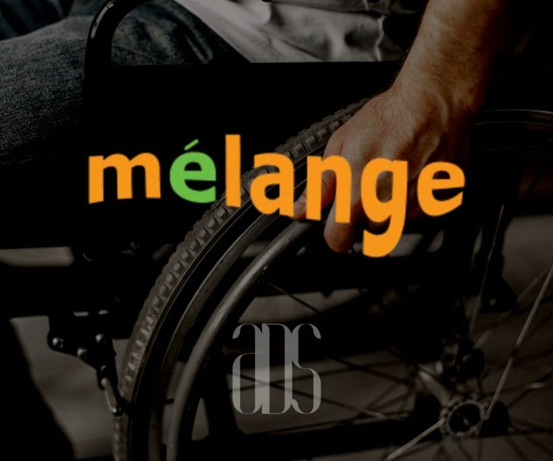 Logo for Melange magazine over a photo closeup of a man in a wheelchair.