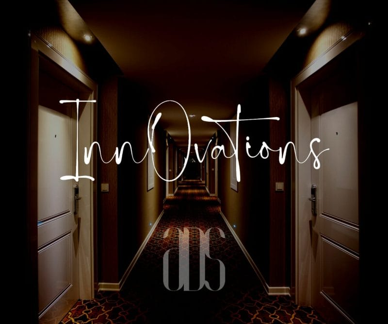 The InnOvations magazine logo on a photo of a hallway in an upscale hotel.