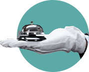 A hand wearing a white glove holds a silver service bell on a flat palm, set against a teal circle. The scene suggests hospitality or concierge service, highlighting the importance of ADA Website Compliance and Accessibility.