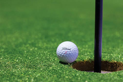 golf ball and tee