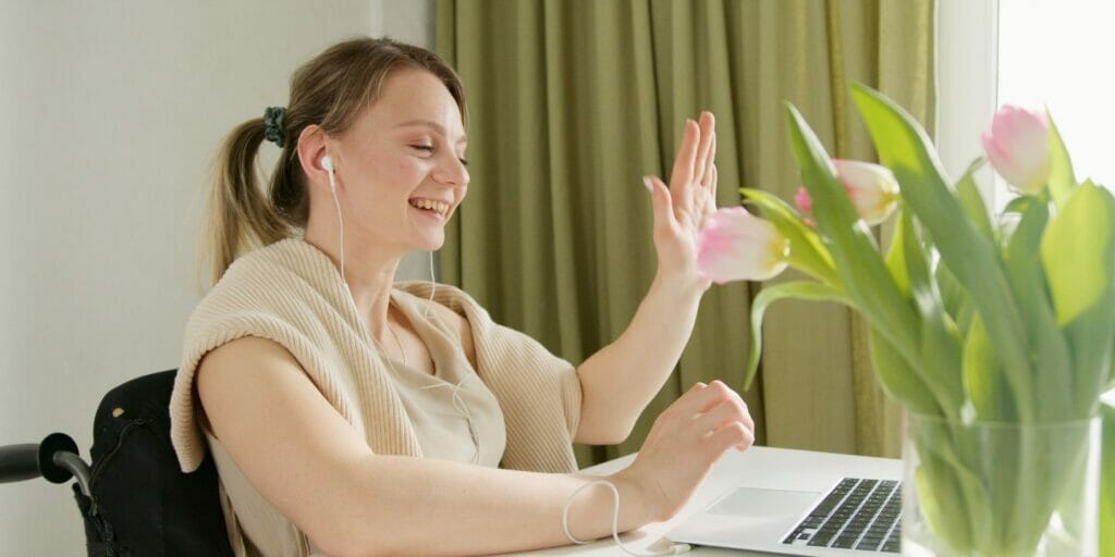 A woman having a video call on the web