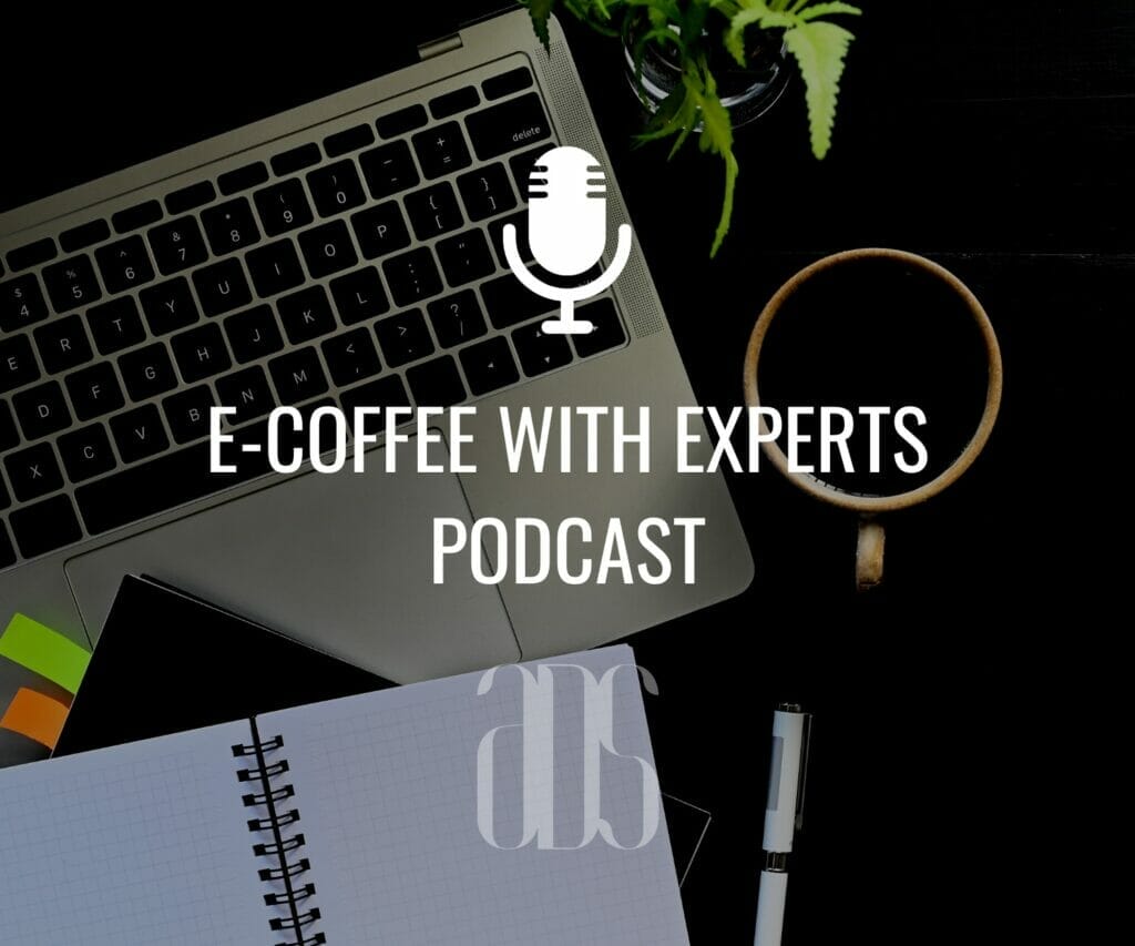 Photo of desk with laptop, coffee mug, and notebook, with the words E Coffee with Experts Podcast and ADS