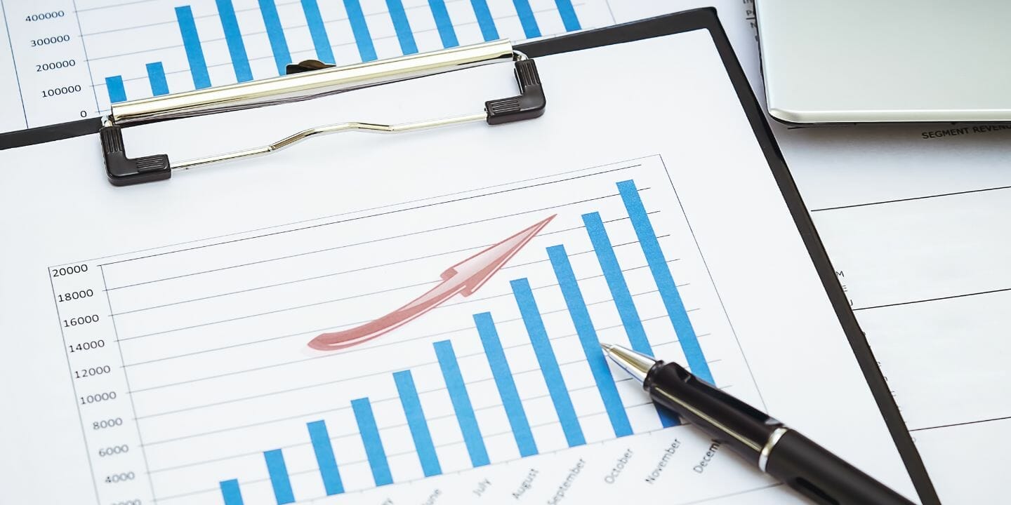 A printed graph showing an upward trend each month